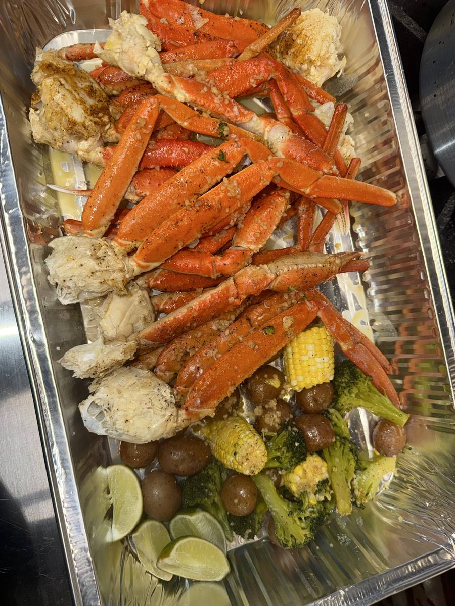Lobster with shrimp, potatoes and vegetables